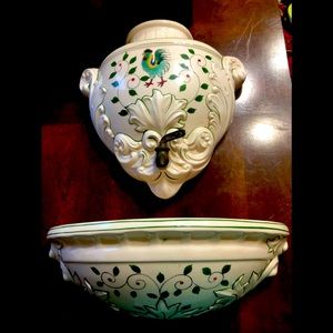 Outdoor water fountain with spout.